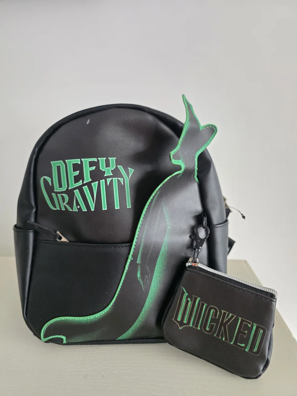 Wicked Defy Black & Green 'Defy Gravity' Men's Backpack with 'Wicked' Coin Pouch